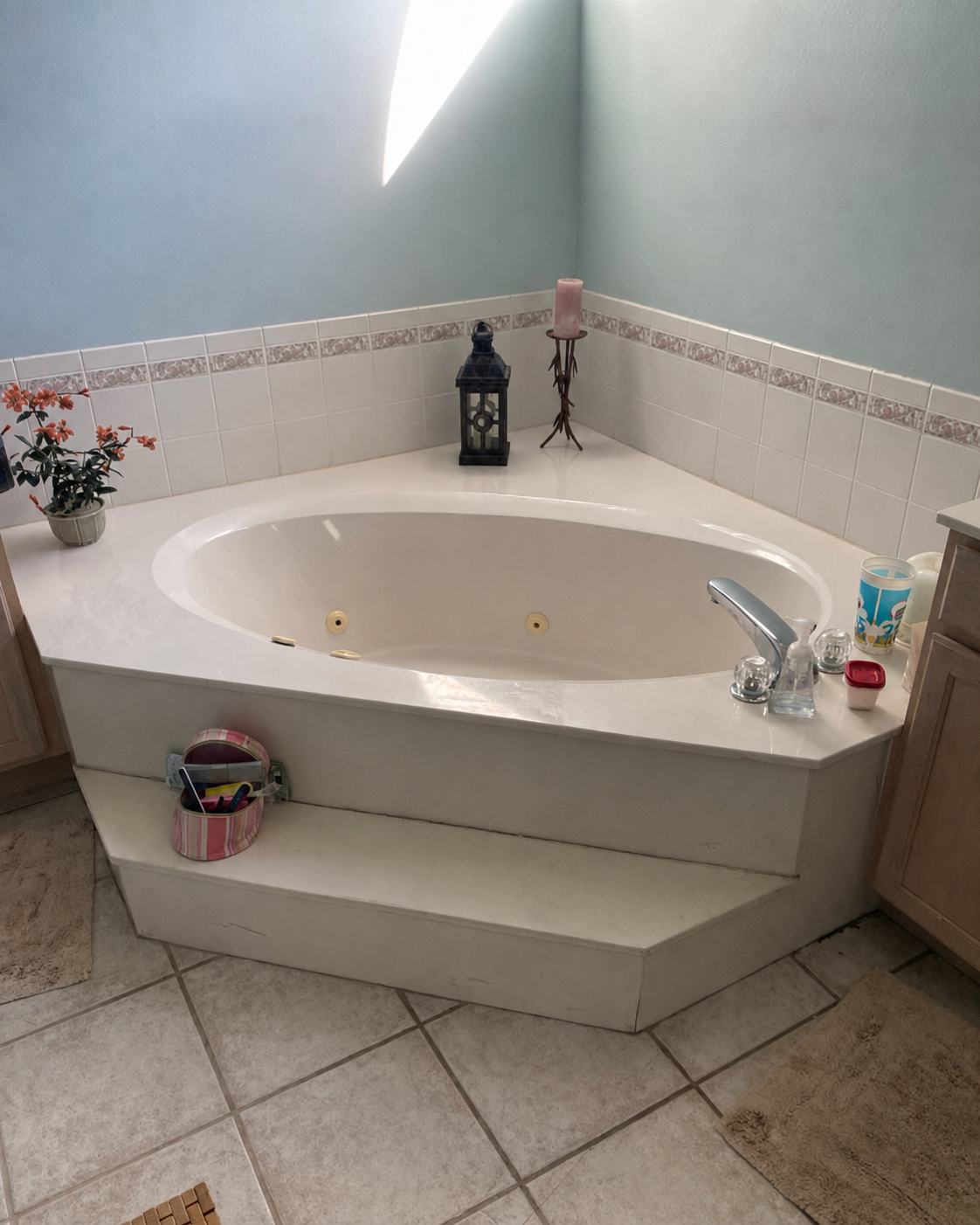 Bathroom before remodel with built-in tub