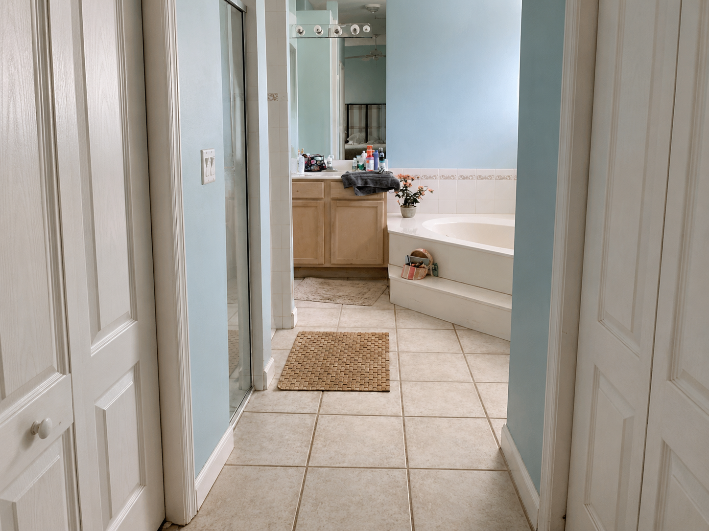 Flooring before renovation with light blue walls