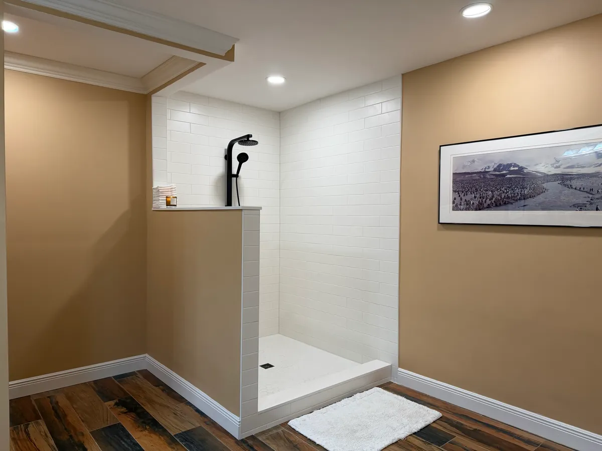 Finished shower remodel with clean tile and trim work
